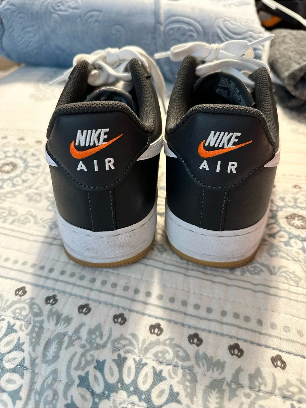 Nike Black and White Air Force 1 Low with Orange Swoosh Accents